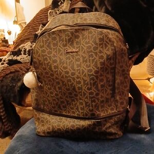 Calvin Klein Monogrammed Brown Backpack